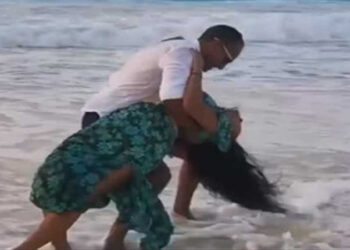 ميرهان حسين تثير الجدل بالرقص برفقة شاب علي الشاطئ