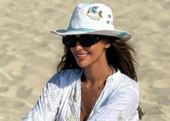 مي سليم تتألق على البحر بـ فستان أبيض