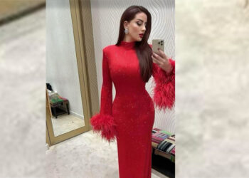 رضوى الشربيني تسأل جمهورها عن إطلالتها باللون الأحمر