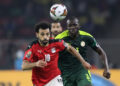 Soccer Football - Africa Cup of Nations - Final - Senegal v Egypt - Olembe Stadium, Yaounde, Cameroon - February 6, 2022 Egypt's Mohamed Salah in action with Senegal's Kalidou Koulibaly REUTERS/Mohamed Abd El Ghany مصر والمغرب والسنغال فى صدارة المرشحين لحصد أمم أفريقيا