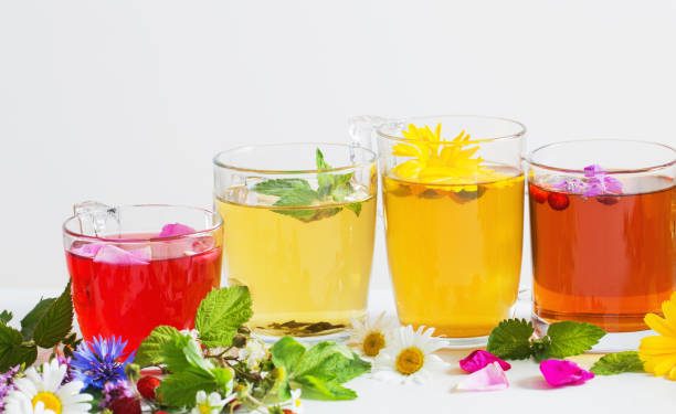 herbal tea in cups on a white background 5 مشروبات عشبية قبل النوم تساعد على الاسترخاء وتهدئة الأعصاب